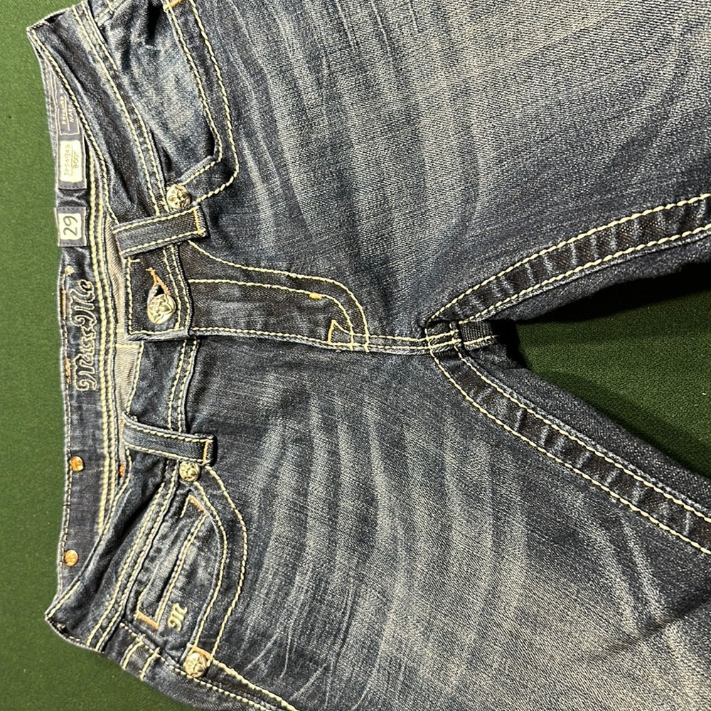 Miss Me Size 29 boot cut jeans.  Beige and white stitching detail on back